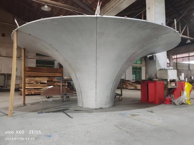 Trumpet-shaped aluminum panel